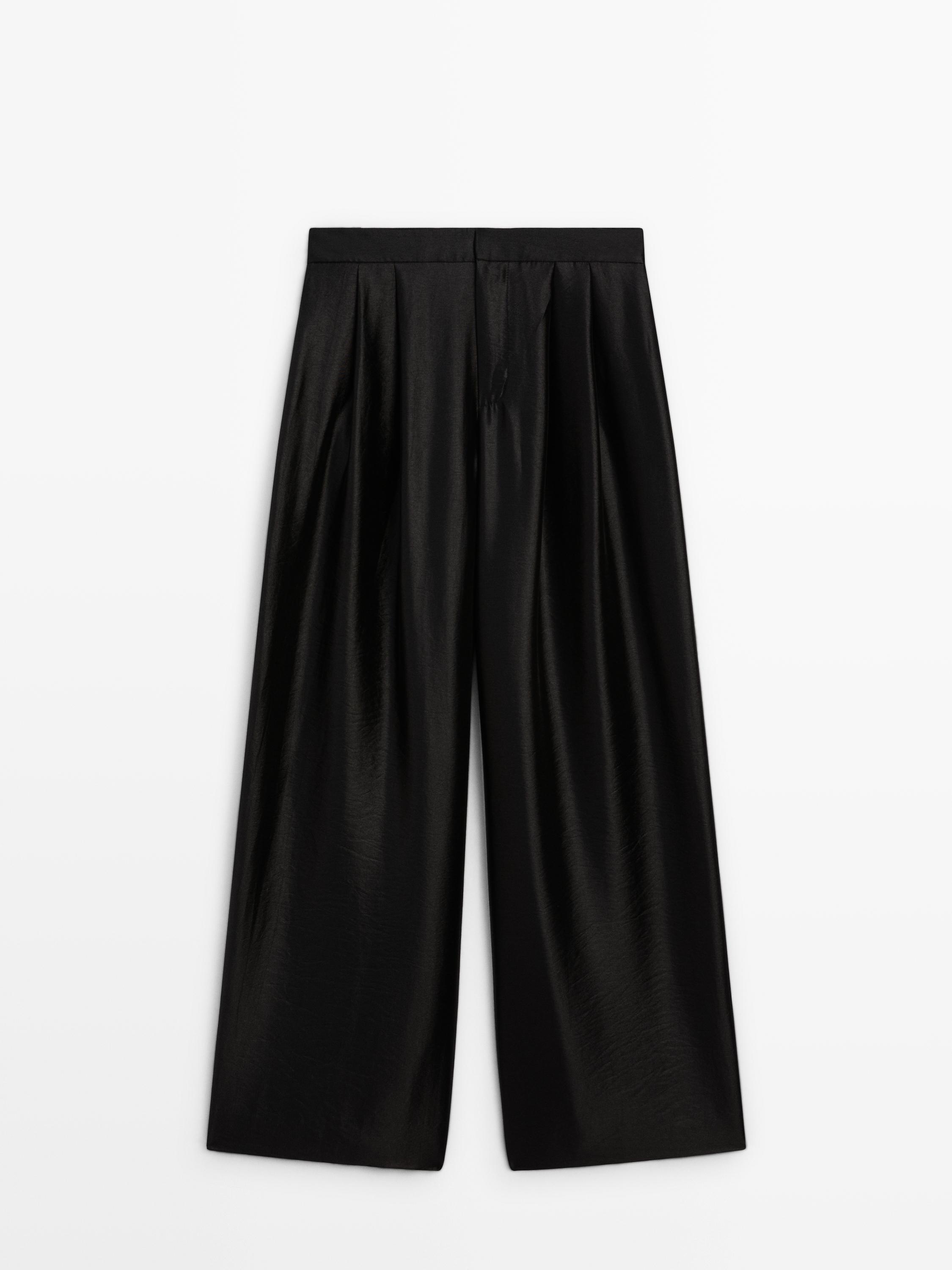 Wide-leg voluminous trousers with darts